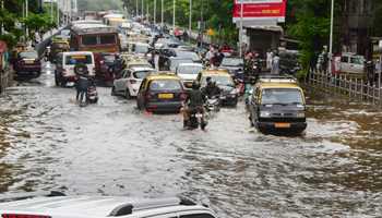 Mumbai is on high alert for heavy rain and is already flooded