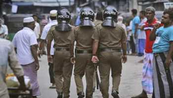 Two members of Sri Lanka's ruling party have been arrested for mob violence