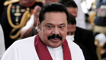 A Sri Lankan court has barred former Prime Minister Mahinda Rajapaksa and his aides from leaving the country