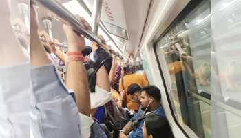 Choking Crowds: Delhi Metro Breaks Ridership Record Amid Pollution Crisis

