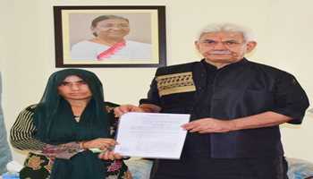 Lt Governor hands over appointment letter to wife of Civilian Bus Driver martyred in Reasi Terror attack