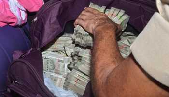 1.12 CRORE ILLEGAL CASH SEIZED FROM TAMIL NADU GOVT OFFICE DURING RIADS