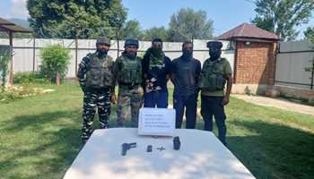 2 HYBRID LET MILITANTS HELD IN BARAMULLA 