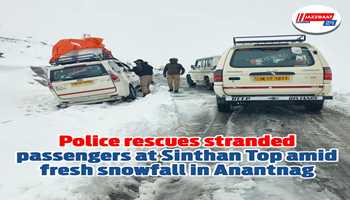 Police rescues stranded passengers at Sinthan Top amid fresh snowfall in Anantnag